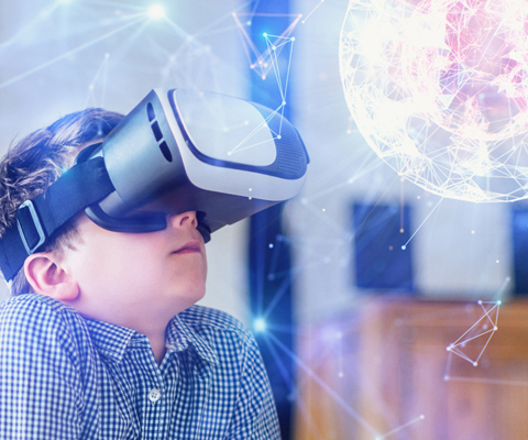 boy with virtual-reality goggles amazed by crystalline structure