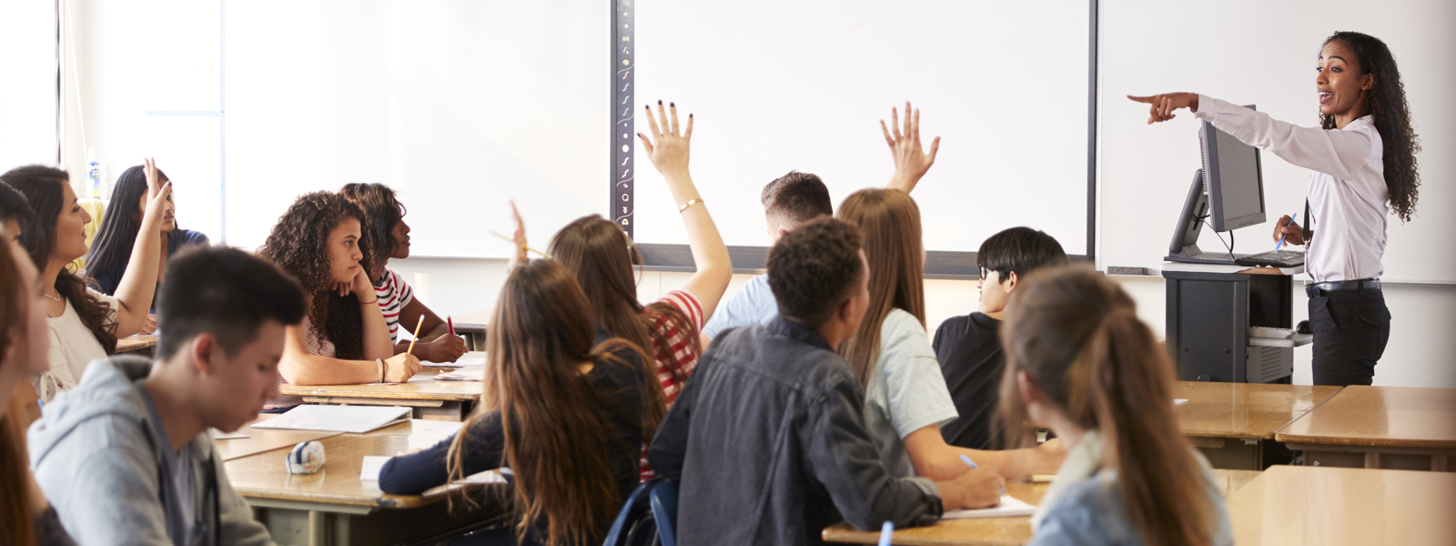 teacher lecturing with students participating